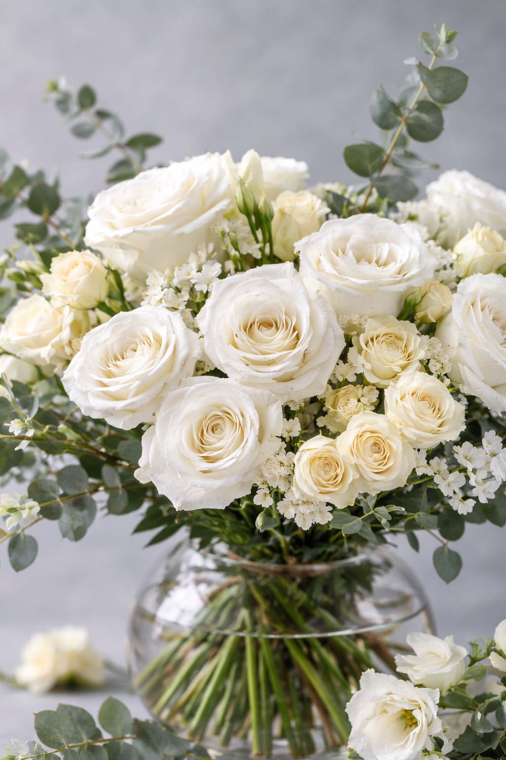 Spray Roses with White Lisianthus in Fish Bowl by Warda Petals