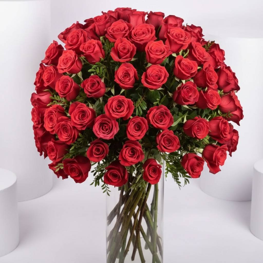 Ravishing 100 Red Roses In Glass Vase by Warda Petals
