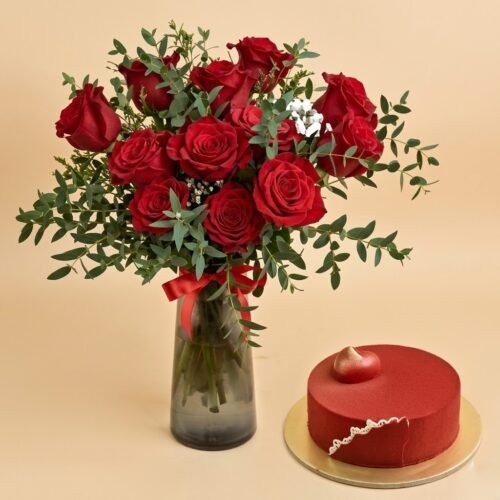 12 Red Roses in Premium Vase And Cake by Warda Petals