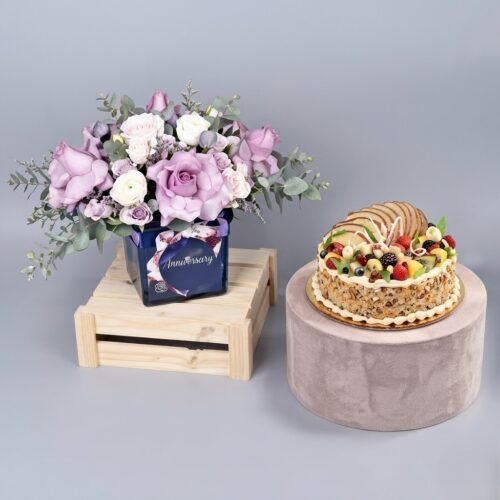 Birthday Roses Arrangement And Cake by Warda Petals