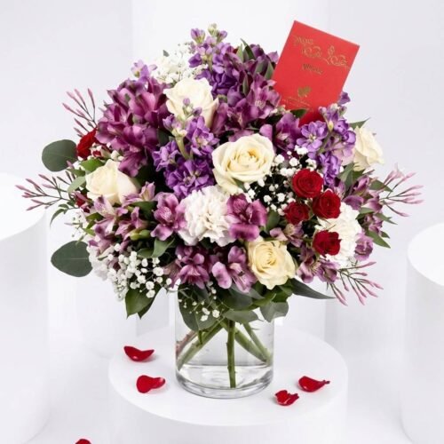 Exotic Purple White Flowers Vase Arrangement by Warda Petals