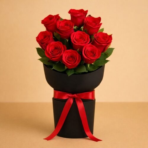 Love Roses – 10 Red Roses Bouquet with Ruscus in Black Sleeves by Warda Petals