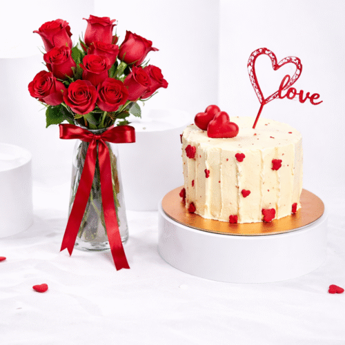 Red Roses And Love Cake – 10 Red Roses in Glass Vase with 1 Kg Red Velvet Cake by Warda Petals