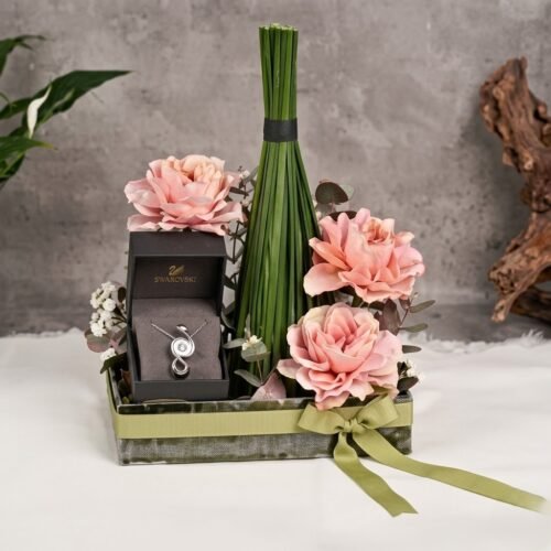 Titan Raga Pink Dial Watch for Her with Floral Arrangement – Elegant Gift Set