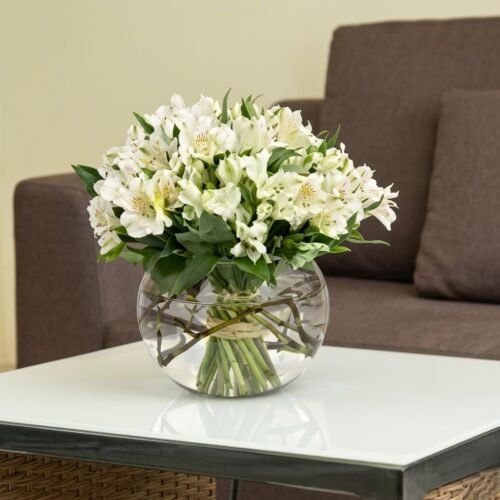 White Peruvian Lily Arrangement by Warda